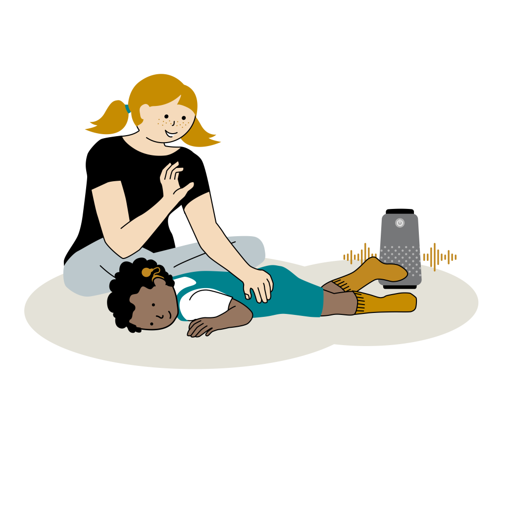 En ung kvinna sitter på golvet med en pojke som ligger på mage framför henne. Pojken har hörapparat och håller sin ena fot mot en vibrerande högtalare. Illustration.